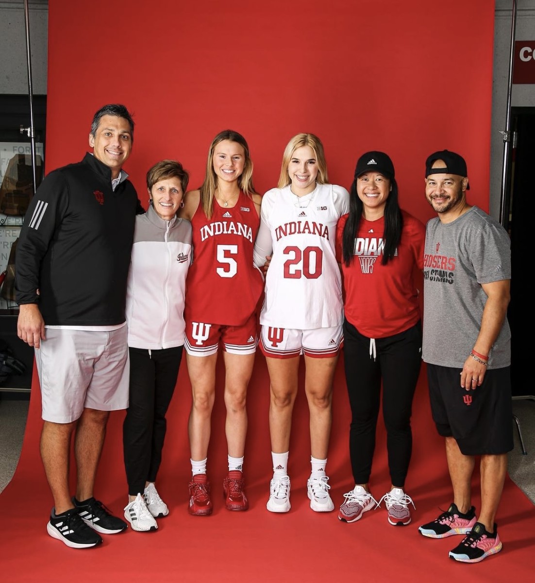 Lenée Beaumont poses with Indiana associate coach Rhet Wierzba, coach Teri Moren, assistant coach Linda Sayavongchanh and associate head coach Glenn Box.